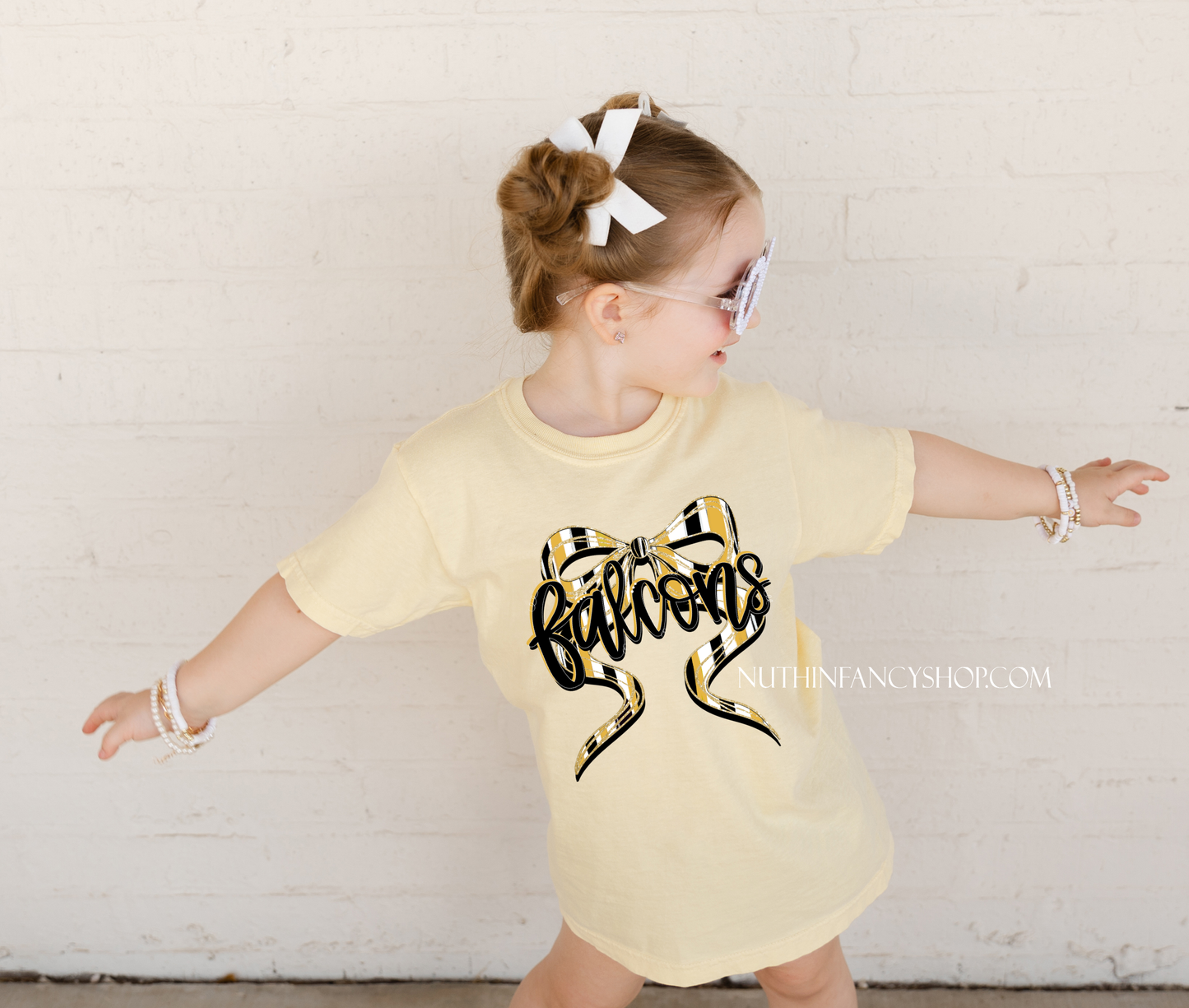 Falcons Hand Drawn Bow on Yellow Gold