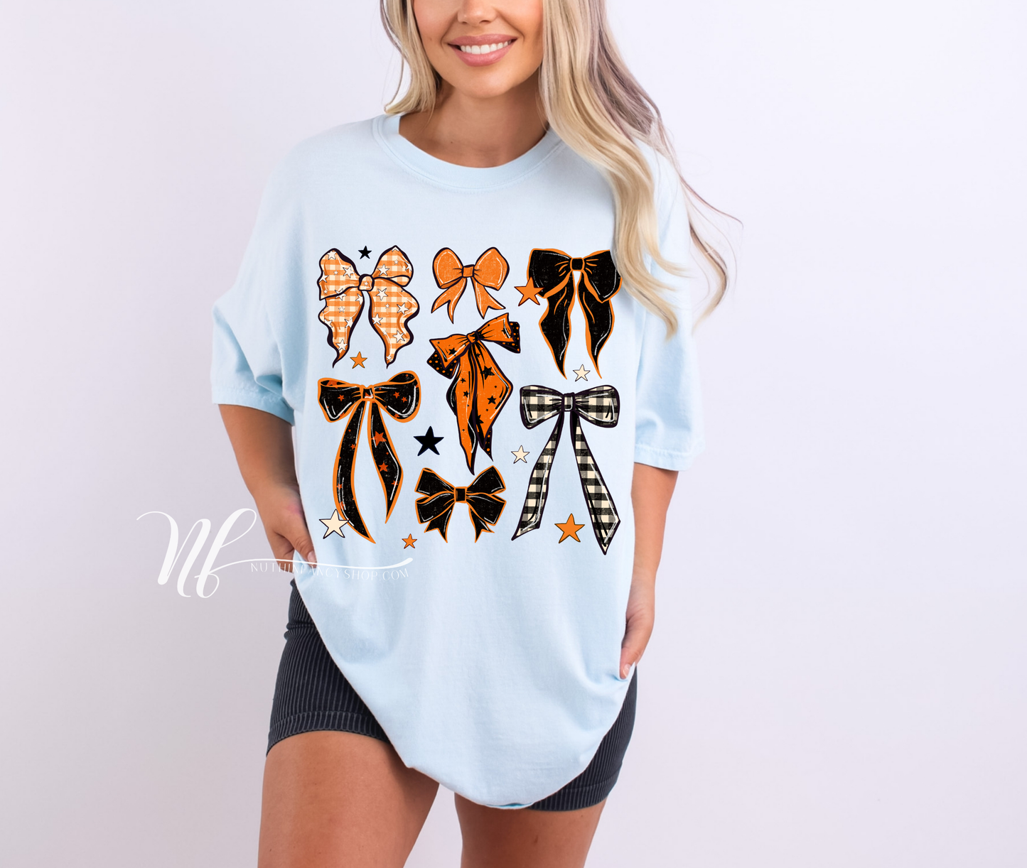 Orange and Black Spooky Bows on Light Blue